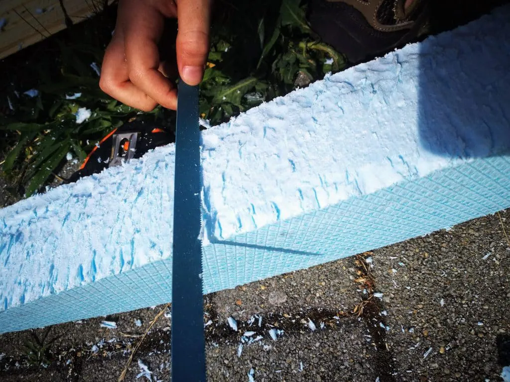 Closeup man hand working with polystyrene insulation material 1048944 6714415 1024x768